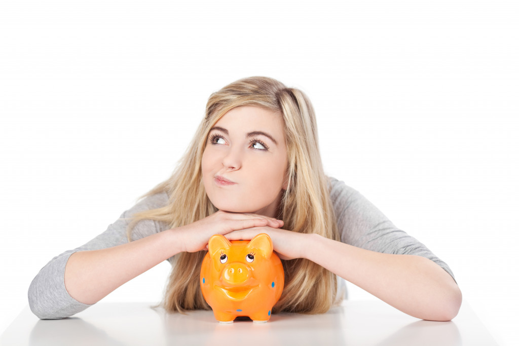 girl with piggybank