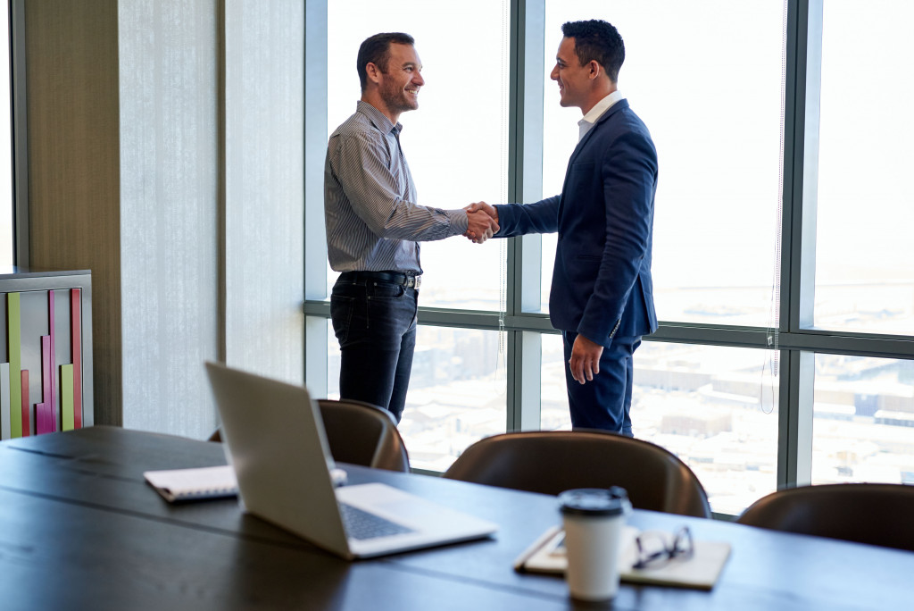 two businessmen shaking hands