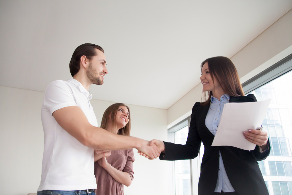 A property manager welcoming tenants